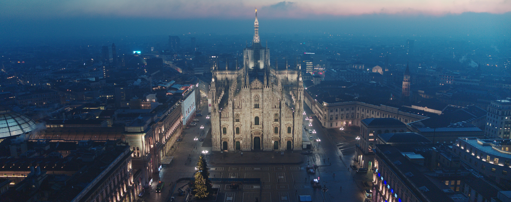 Illuminated Milan Cathedral at night, a landmark enhanced by ERCO lighting design.