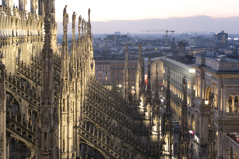 Milan Cathedral illuminated by ERCO LEDs, showcasing facade details in the evening light.