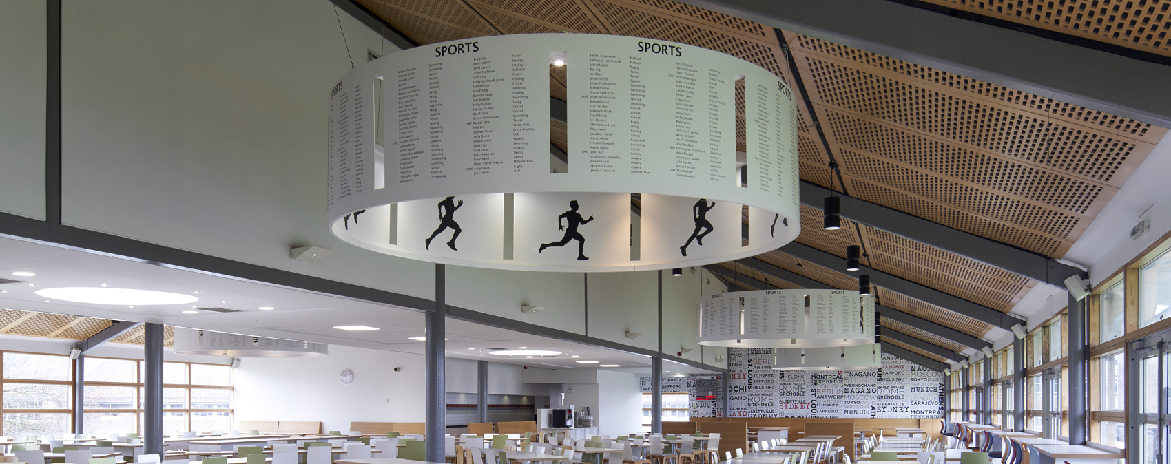 ERCO Atrium pendant luminaires at Millfield School, providing energy-efficient LED lighting in the dining hall.
