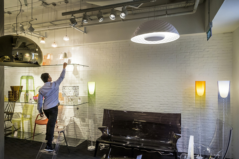 Million Lighting showroom in Singapore featuring ERCO LED lighting and diverse designer furniture.