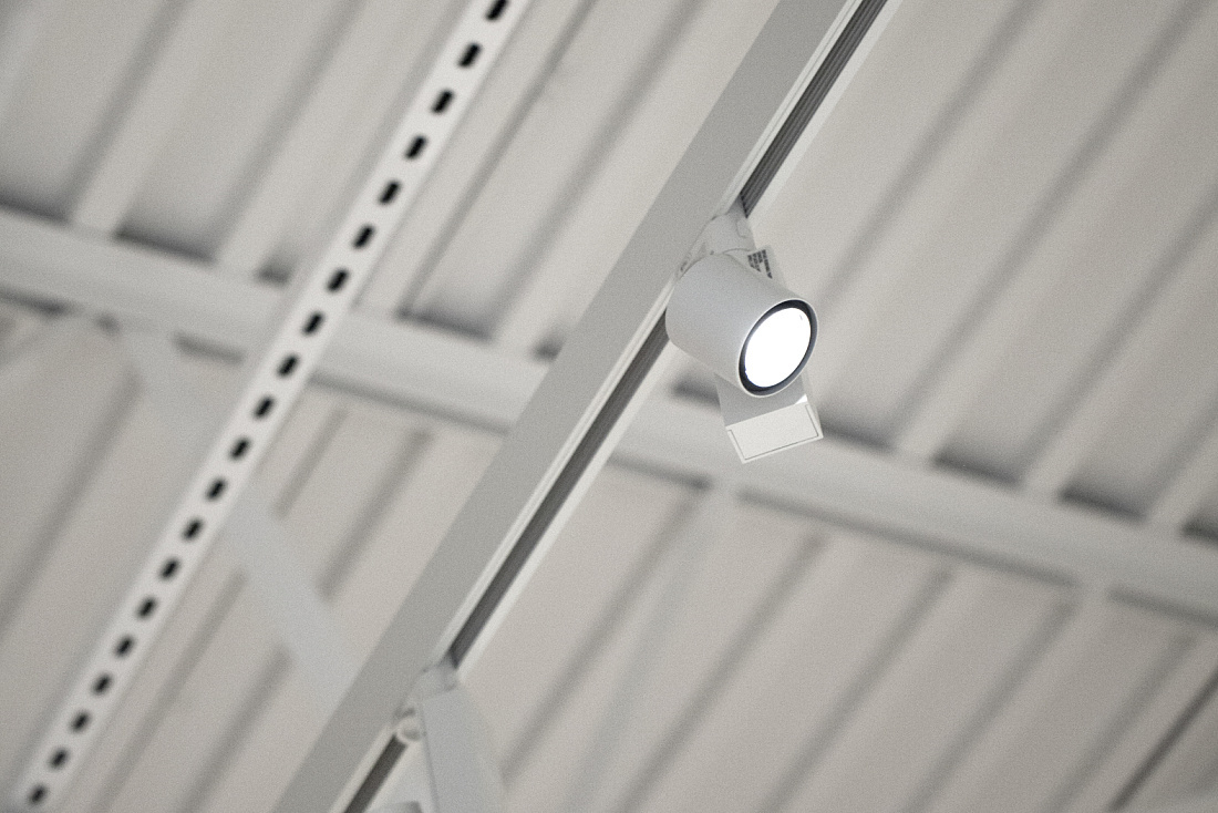 ERCO Optec spotlight on a track, illuminating art at the Minnesota Marine Art Museum.