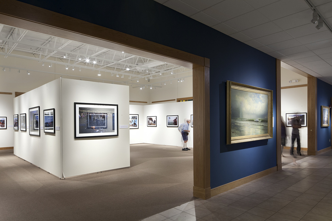 Minnesota Marine Art Museum interior featuring art and ERCO Optec spotlights.