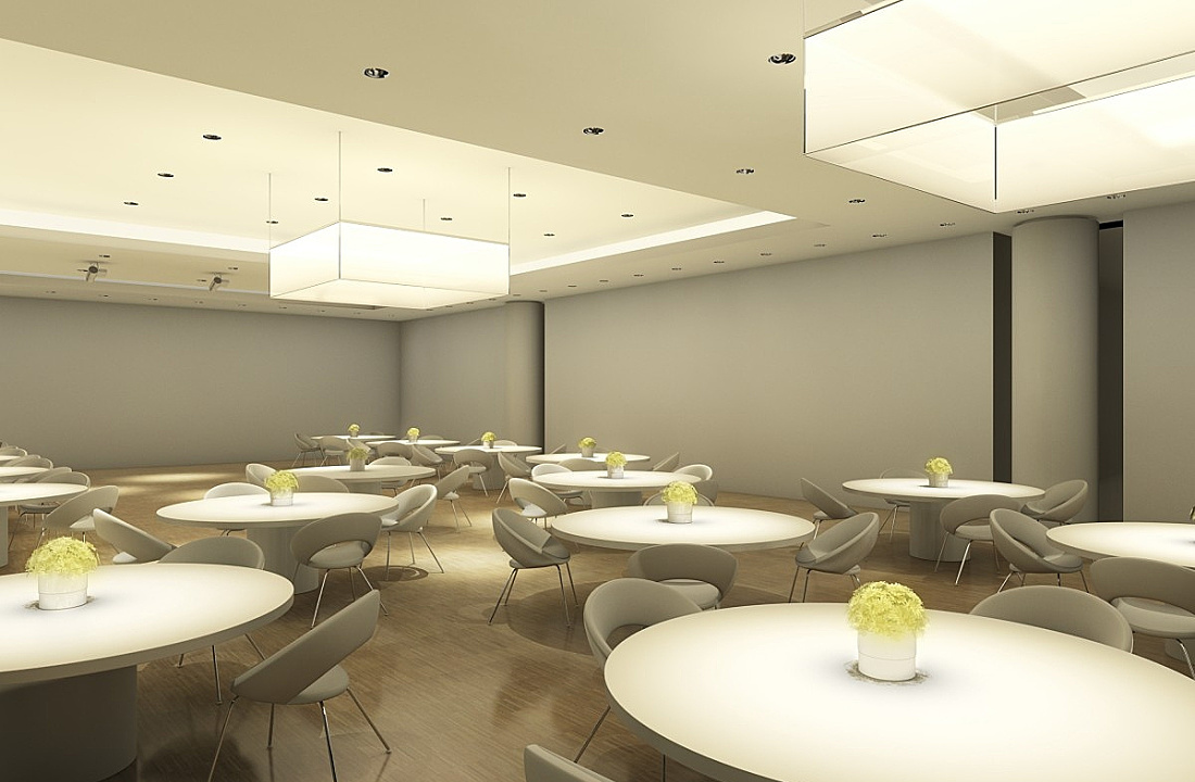 Gala multifunctional room featuring accent lighting on tables and wallwashing for a festive ambiance.