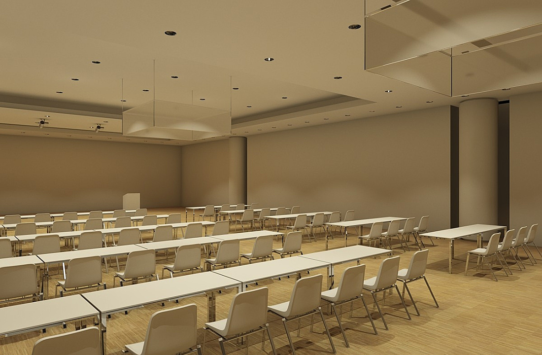 Seminar room with tables and chairs, lit by ERCO downlights for presentations.