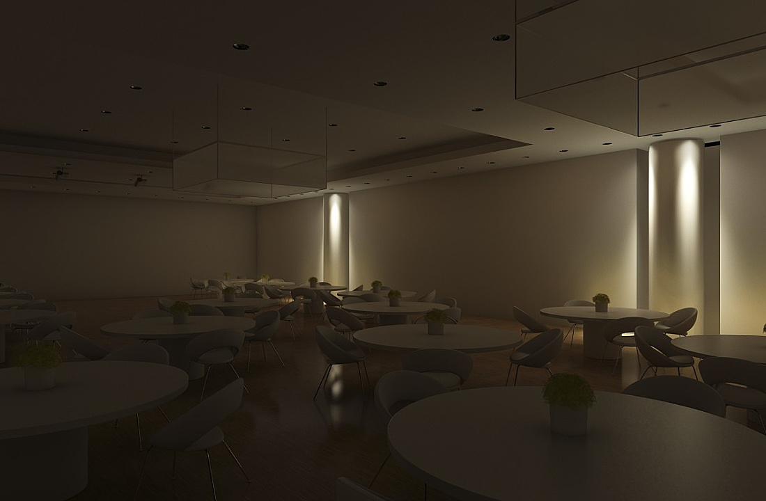 Multifunctional seminar room featuring downlights and wallwashers for flexible lighting scenes.
