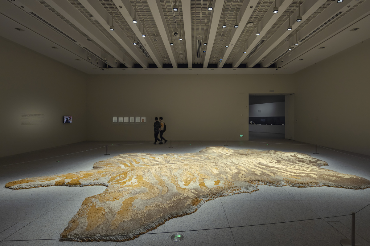 Art exhibit at the Museum of Art Pudong, Shanghai, illuminated by ERCO LED spotlights for high-quality lighting.