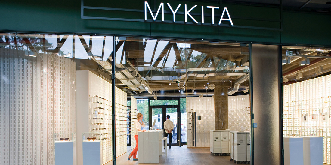 MYKITA store in Berlin featuring ERCO LED spotlights for product presentation.