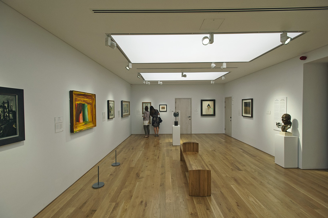ERCO LED spotlights illuminate art in the National Museum of Wales, using track lighting for gallery ambiance.
