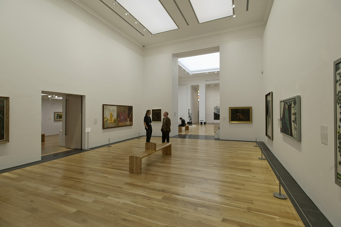ERCO LED spotlights illuminate art in the National Museum of Wales gallery space.