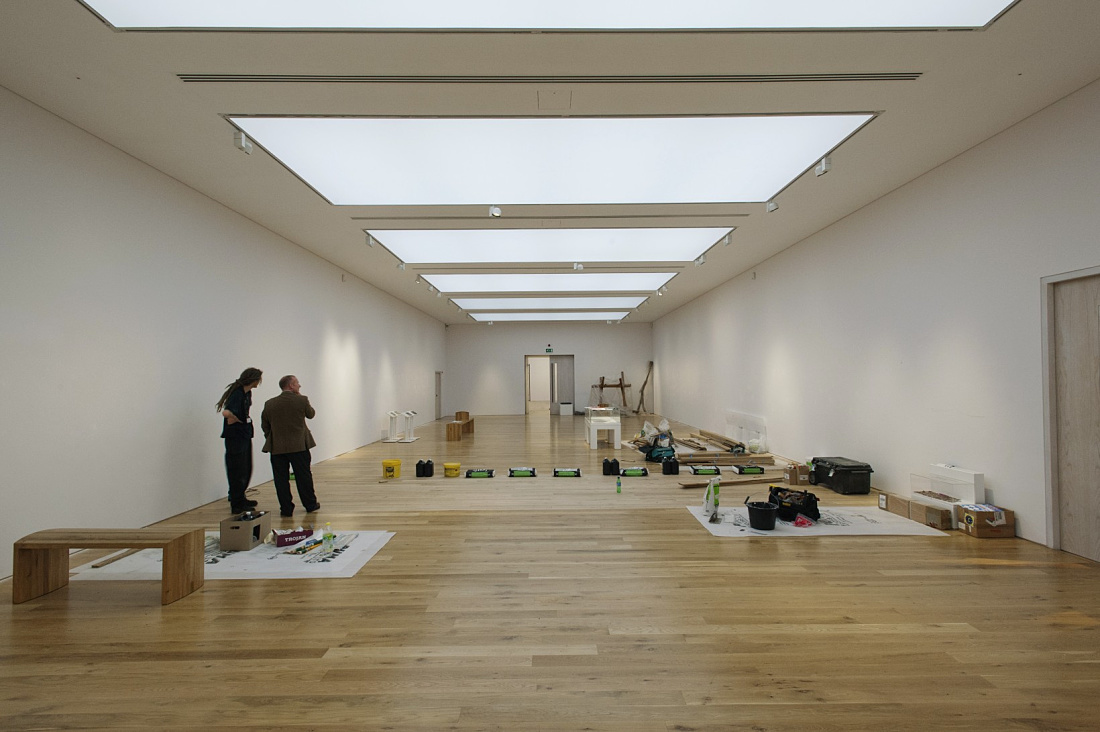 ERCO LED lighting in the National Museum of Wales, illuminating gallery spaces with spotlights and ceiling elements.