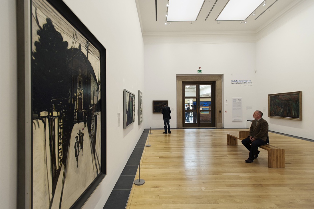 LED-lit art gallery at the National Museum of Wales, featuring ERCO spotlights on tracks.
