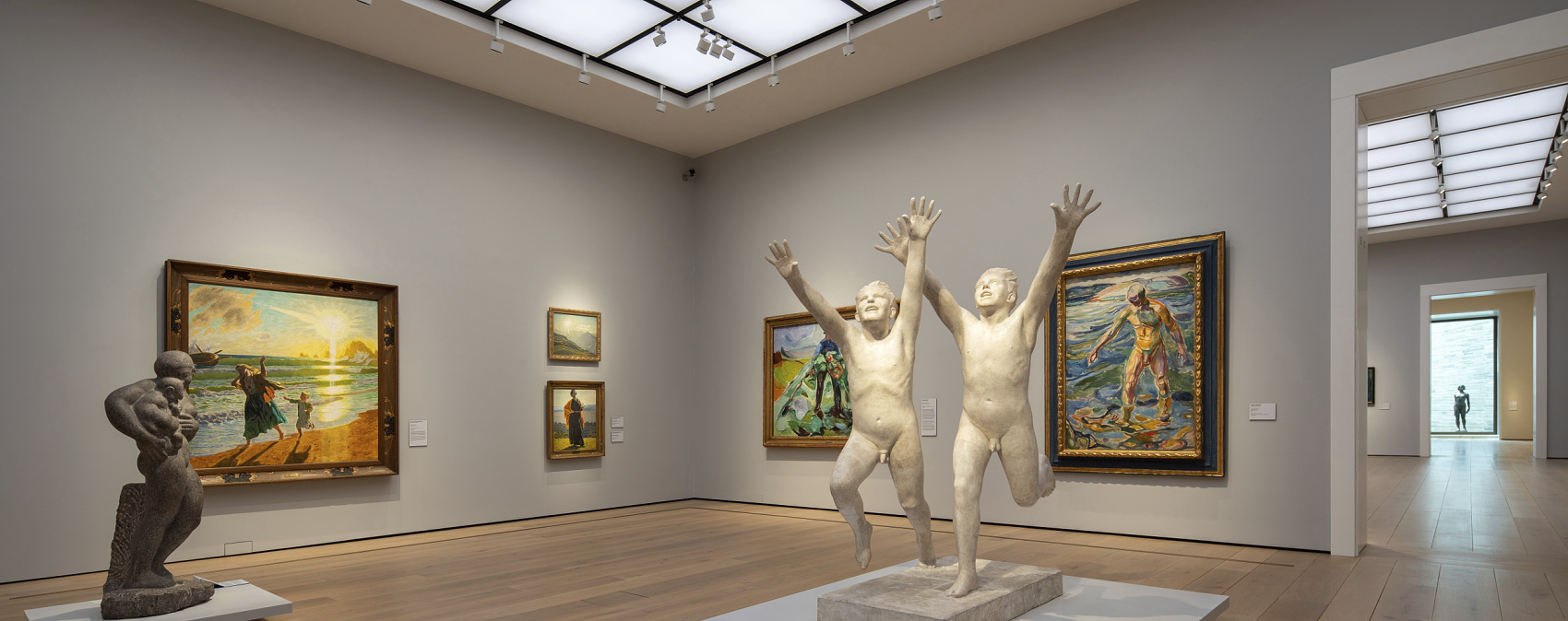 National Museum Oslo exhibition space featuring sculptures and paintings, illuminated by ERCO spotlights.