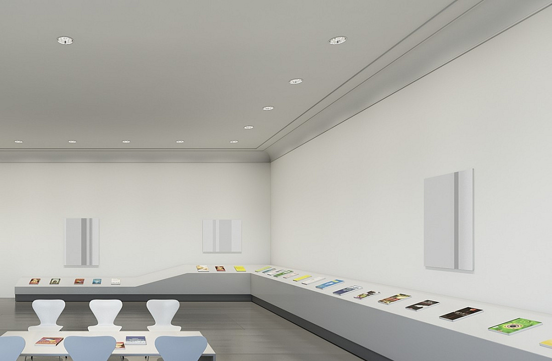 Exhibition space with ERCO recessed ceiling luminaires for neutral lighting.