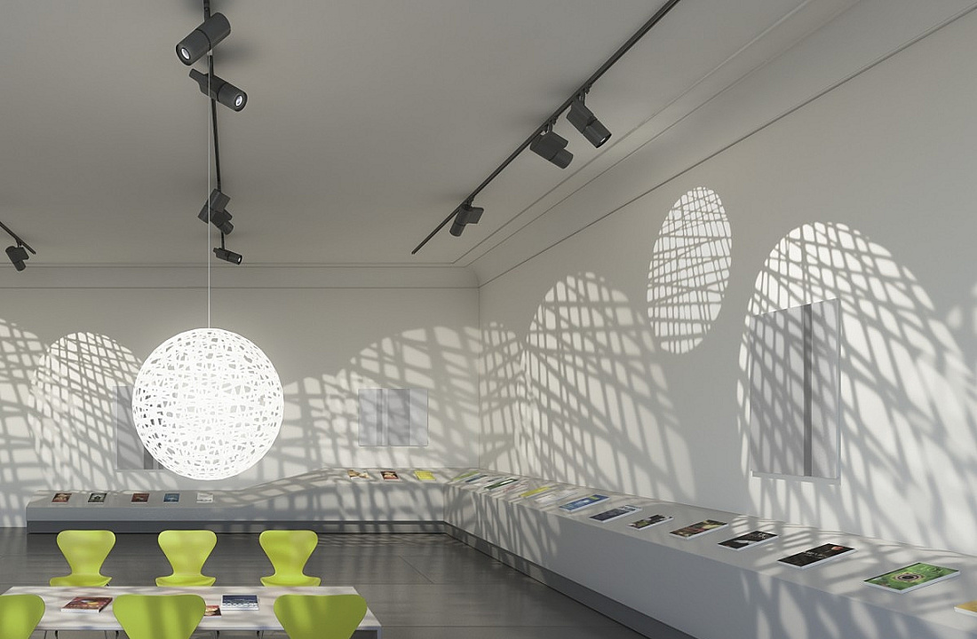 ERCO lighting solution with neutral illumination and spotlight accents in an exhibition space.