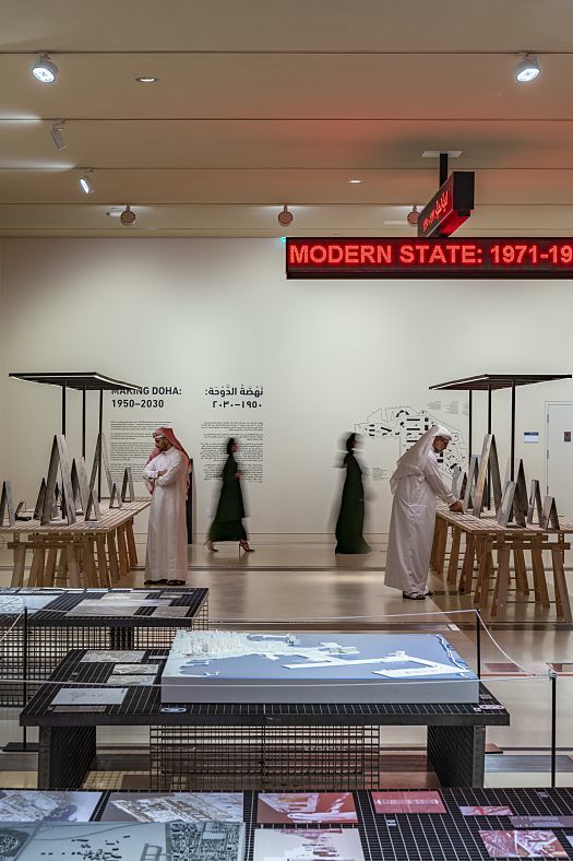 National Museum of Qatar interior featuring ERCO lighting and exhibits on display.