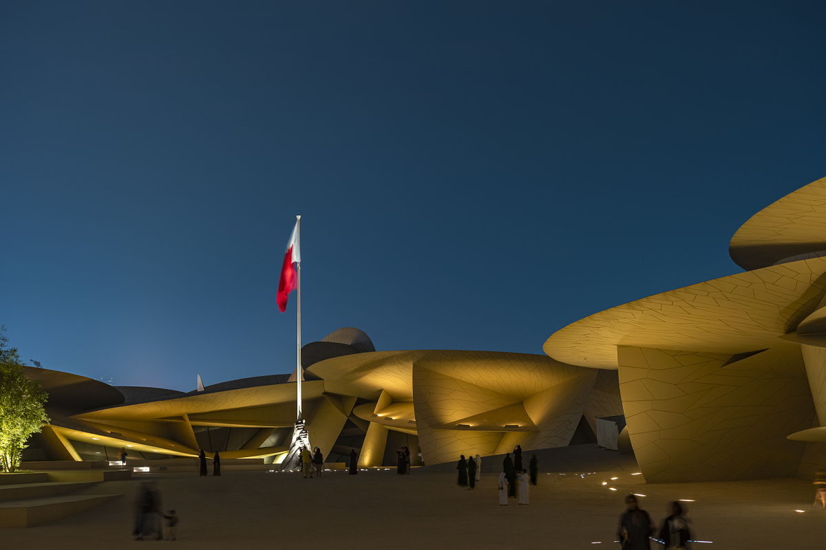 The National Museum of Qatar, illuminated by ERCO lighting at night.