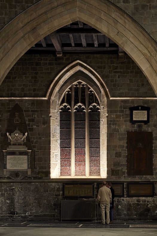ERCO LED lighting in Newcastle Cathedral highlighting the historic stained glass window.