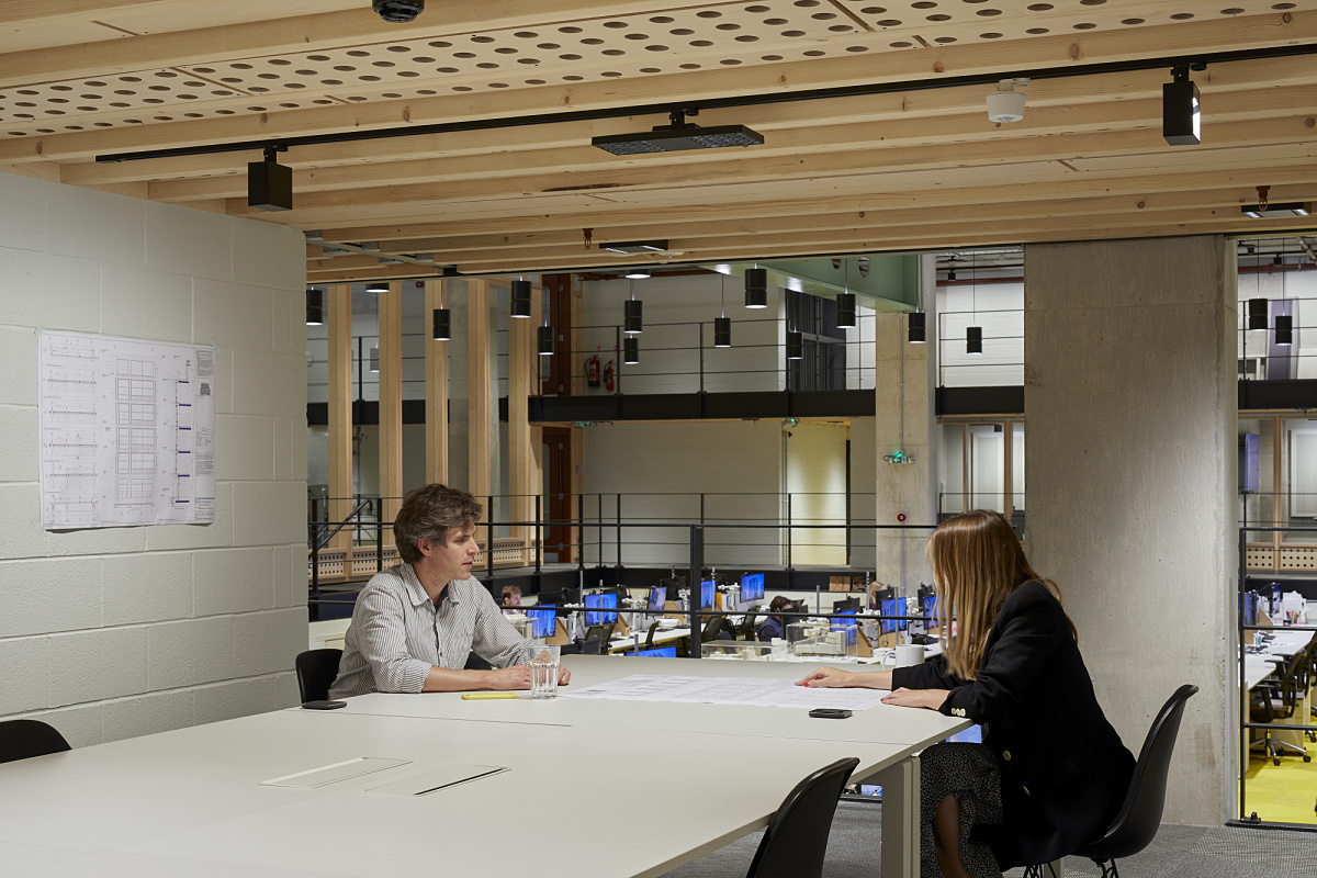 AHMM Architects office in London using flexible ERCO Jilly track downlights for office lighting.
