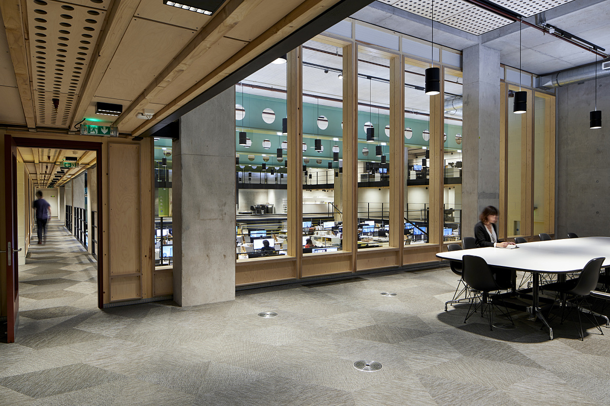AHMM Architects office in London featuring ERCO track downlights for flexible office lighting.
