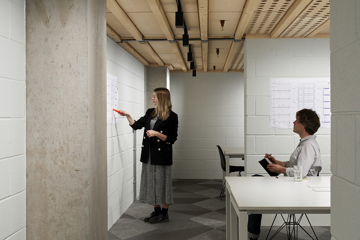 AHMM Architects office in London using flexible ERCO track downlights and human centric lighting.