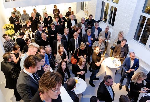 ERCO showroom opening in Stockholms Luma Park, featuring guests and LED lighting.
