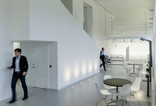 ERCO Showroom Stockholm: Lighting solution featuring Compact, Quadra, Quintessence, and Skim luminaires in a modern office.