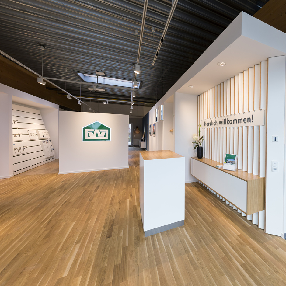 Otto Wulff showroom reception area featuring ERCO LED lighting for brand communication.