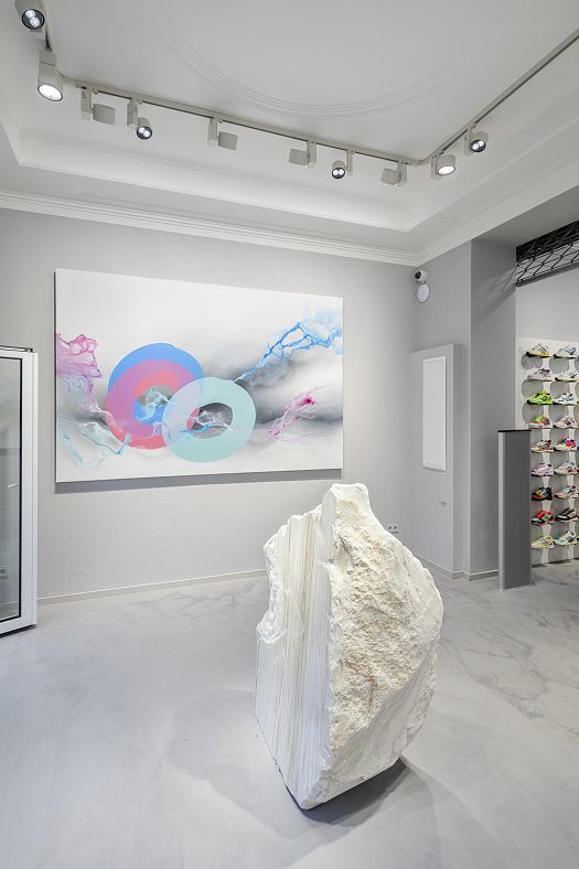 ERCO Optec spotlights illuminate art and sneakers in the Overkill store, Cologne.