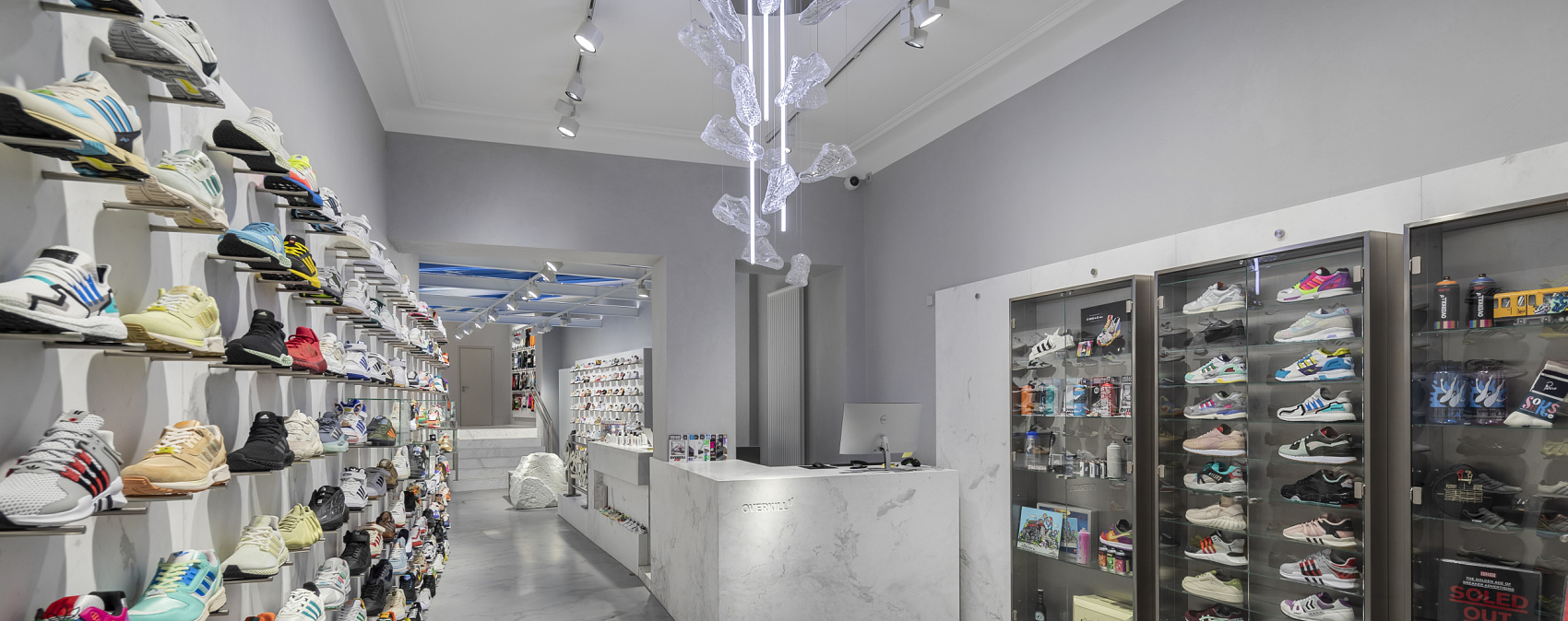 ERCO LED lighting in the Overkill sneaker store, Cologne. Accent lights highlight sneakers and art objects.