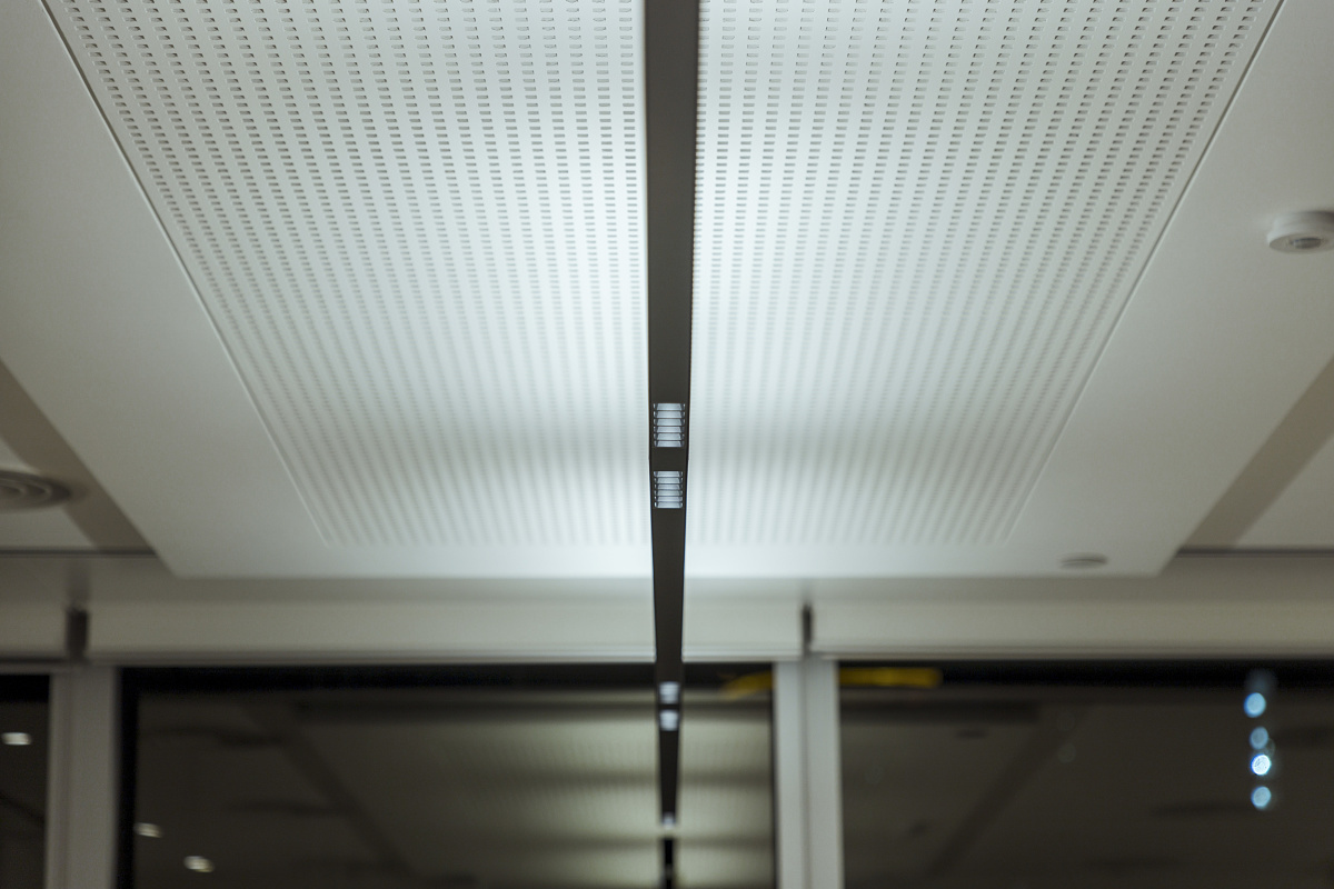 ERCO Compar pendant luminaire providing visual comfort in PAG office, Hong Kong.