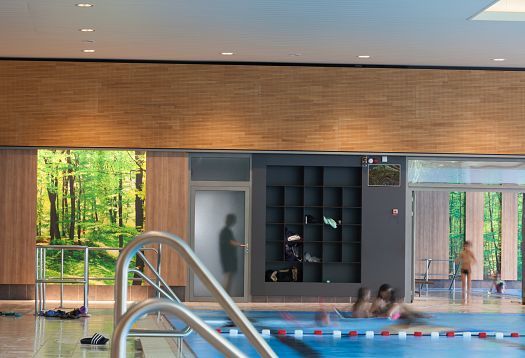 Interior of Parkbad Volksdorf featuring ERCO Compact downlights for glare-free lighting.