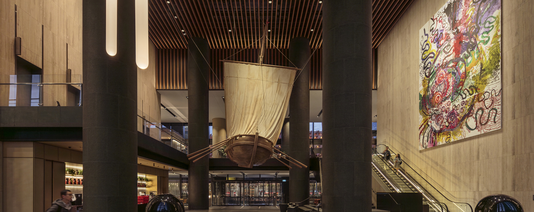 Parramatta Square lobby featuring a boat art installation and ERCO lighting.