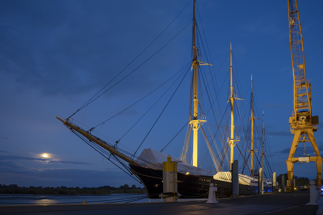The Peking sailing ship, a four-masted barque in Hamburg harbor, lit by ERCO lighting.