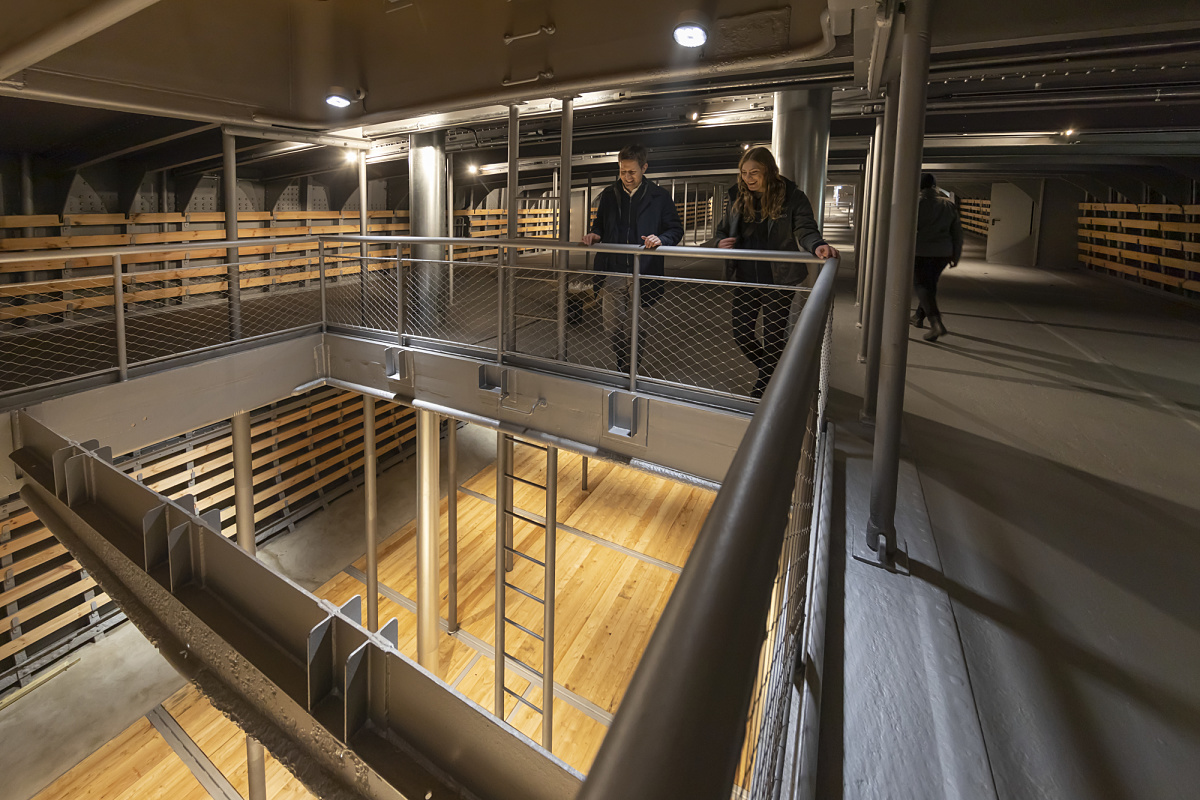 Interior of the 'Peking' sailing ship, featuring ERCO lighting that highlights the historic structure for museum visitors.