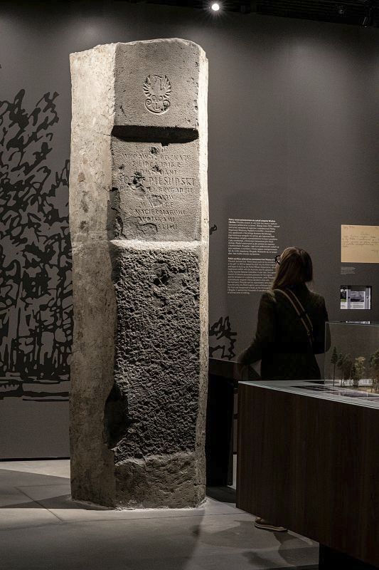 Józef Piłsudski Museum exhibit: Historic inscribed stone illuminated by ERCO spotlights.