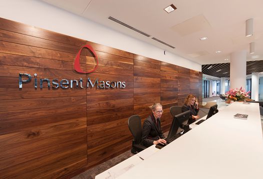 Pinsent Masons law firm reception area in Belfast, featuring ERCO lighting.