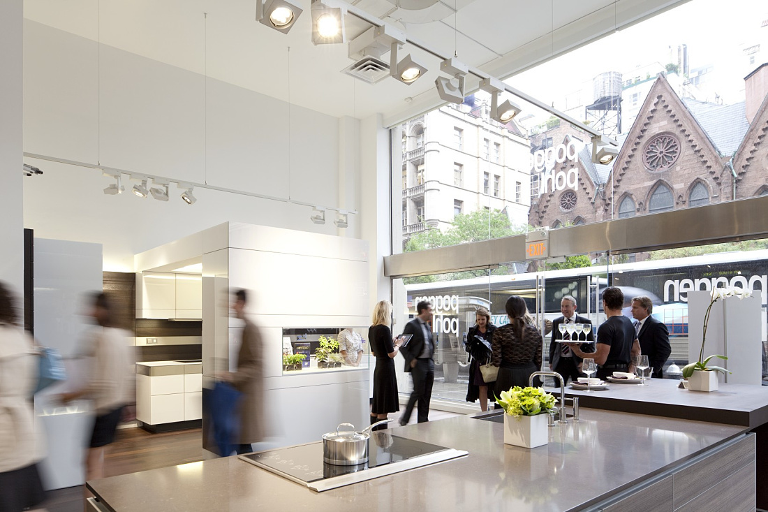 Poggenpohl kitchen showroom in New York, illuminated by Cantax LED spotlights on ERCO track.