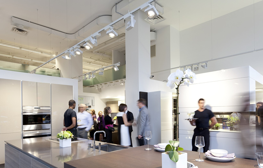 Poggenpohl showroom featuring Cantax LED spotlights on ERCO track for accent lighting.