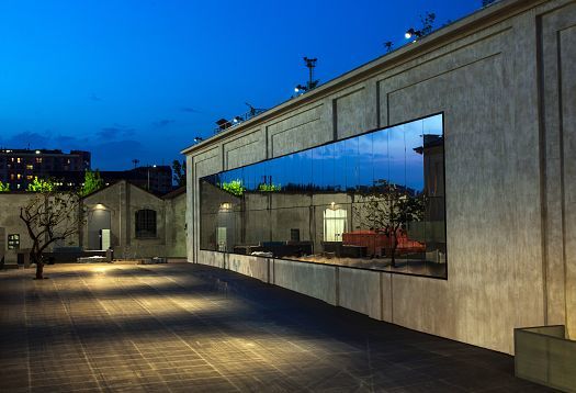 Fondazione Prada Museum in Milan, illuminated with ERCO LED lighting for art exhibitions.
