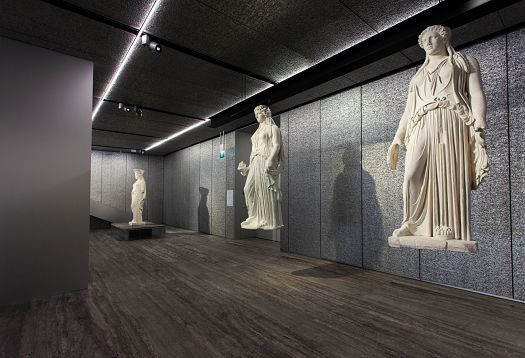 ERCO LED lighting illuminating statues at the Fondazione Prada Museum, Milan.