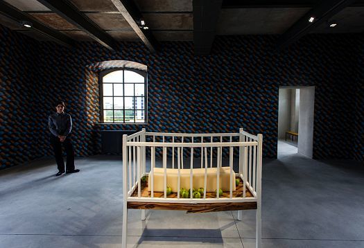 Art installation at Fondazione Prada, Milan, illuminated by ERCO LED spotlights.