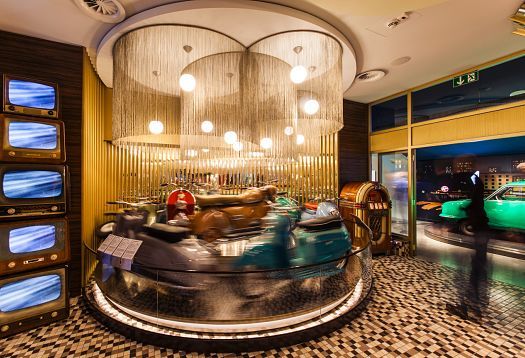 PS.Speicher Museum carousel featuring vintage motorcycles, illuminated by ERCO Cantax LED spotlights.