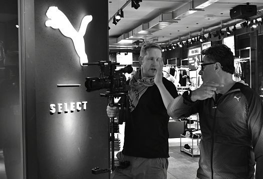 Pablo Rodriguez of PUMA being interviewed, filmed with ERCO LED lighting in the PUMA Store Berlin.