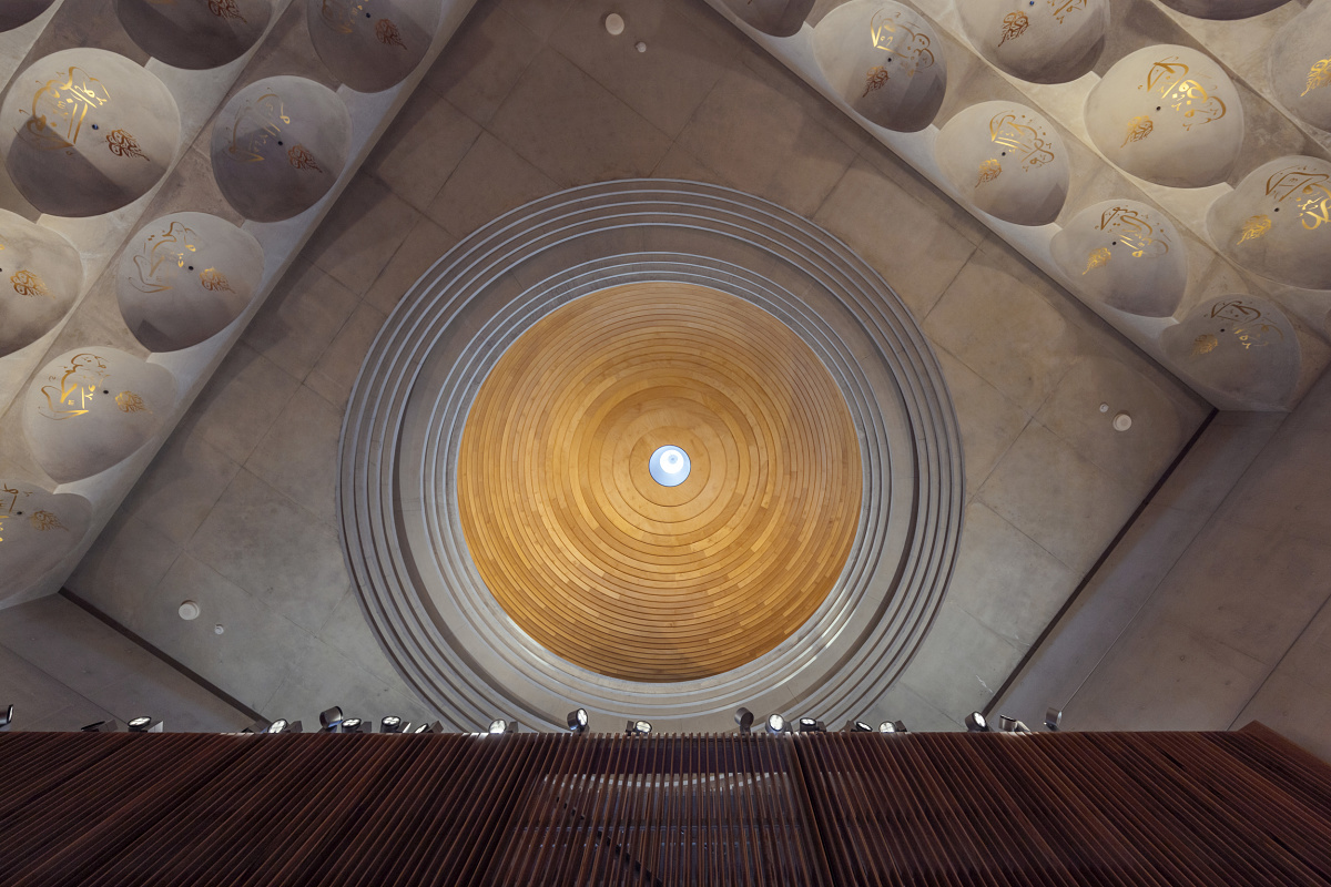 View of the Punchbowl Mosque dome, illuminated by ERCO lighting for visual comfort.