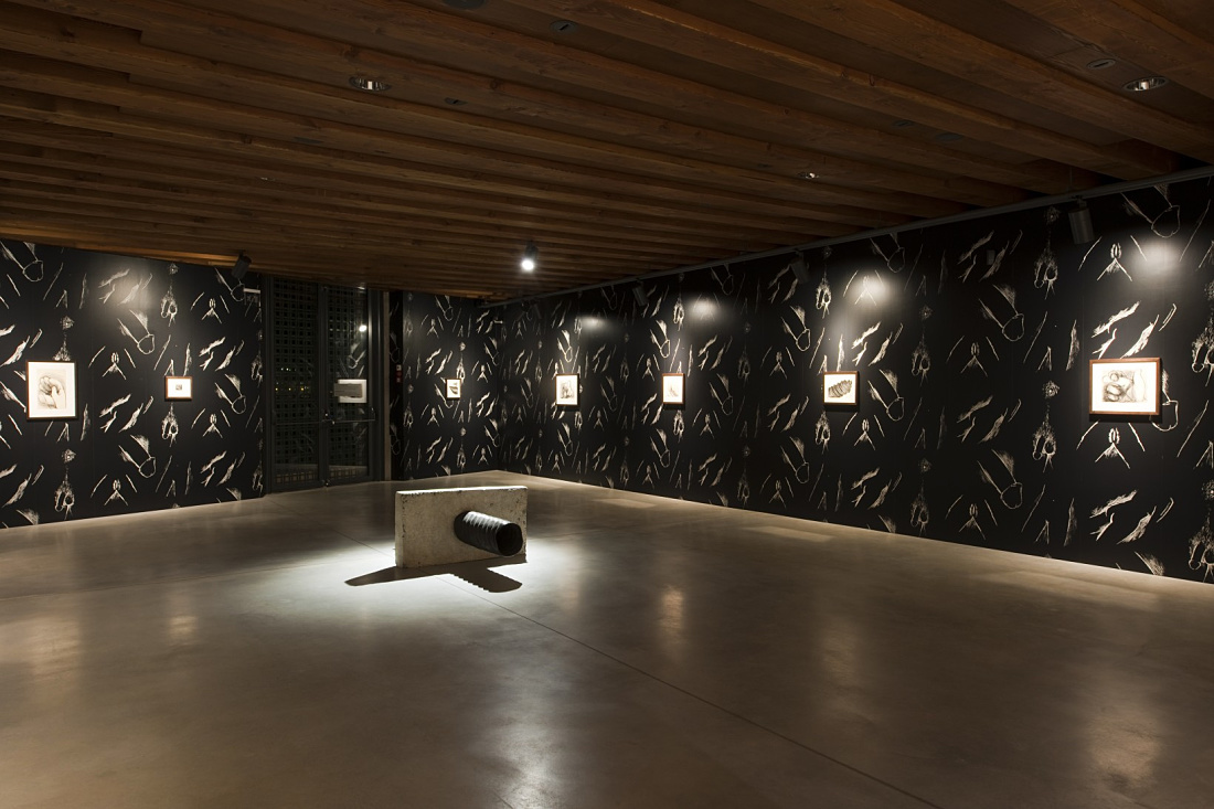 Interior of Punta della Dogana featuring art and ERCO lighting.