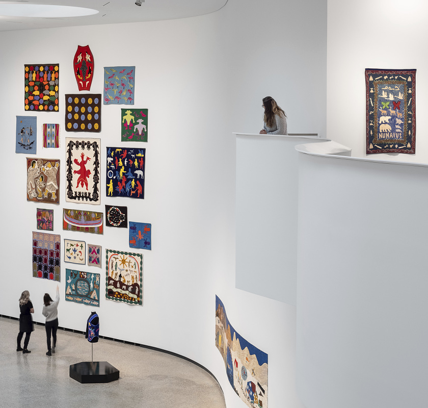 Qaumajuq Art Gallery featuring ERCO Optec spotlights illuminating Inuit art.