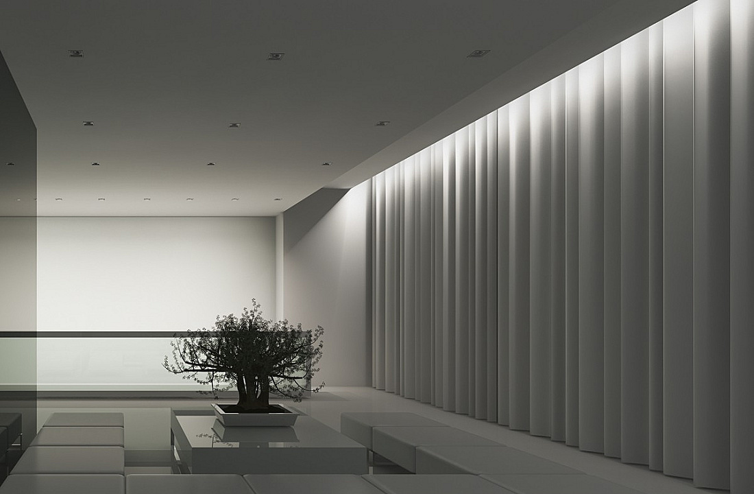 Illuminated room featuring ERCO recessed ceiling luminaires and a textile wall for soft, diffused light.