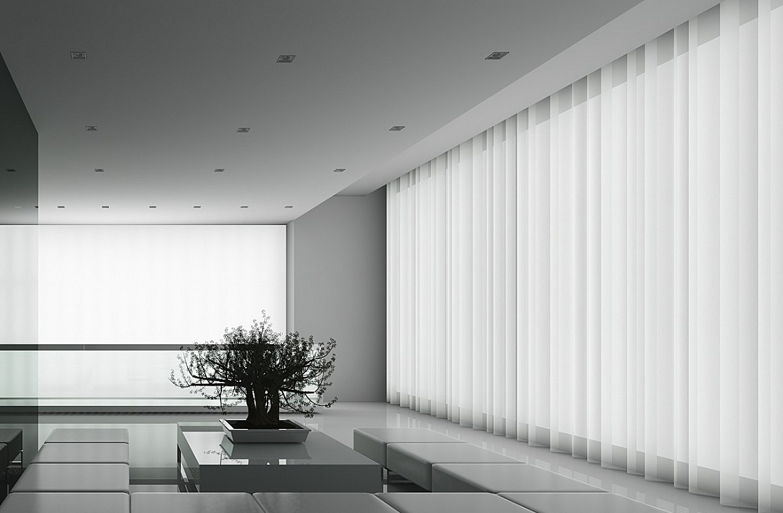 ERCO recessed ceiling luminaires illuminate a minimalist room with curtains and a bonsai tree.