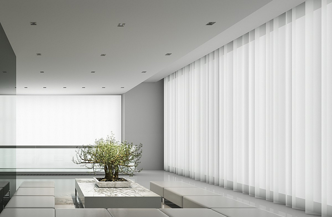 Minimalist room featuring ERCO recessed ceiling luminaires providing soft light.