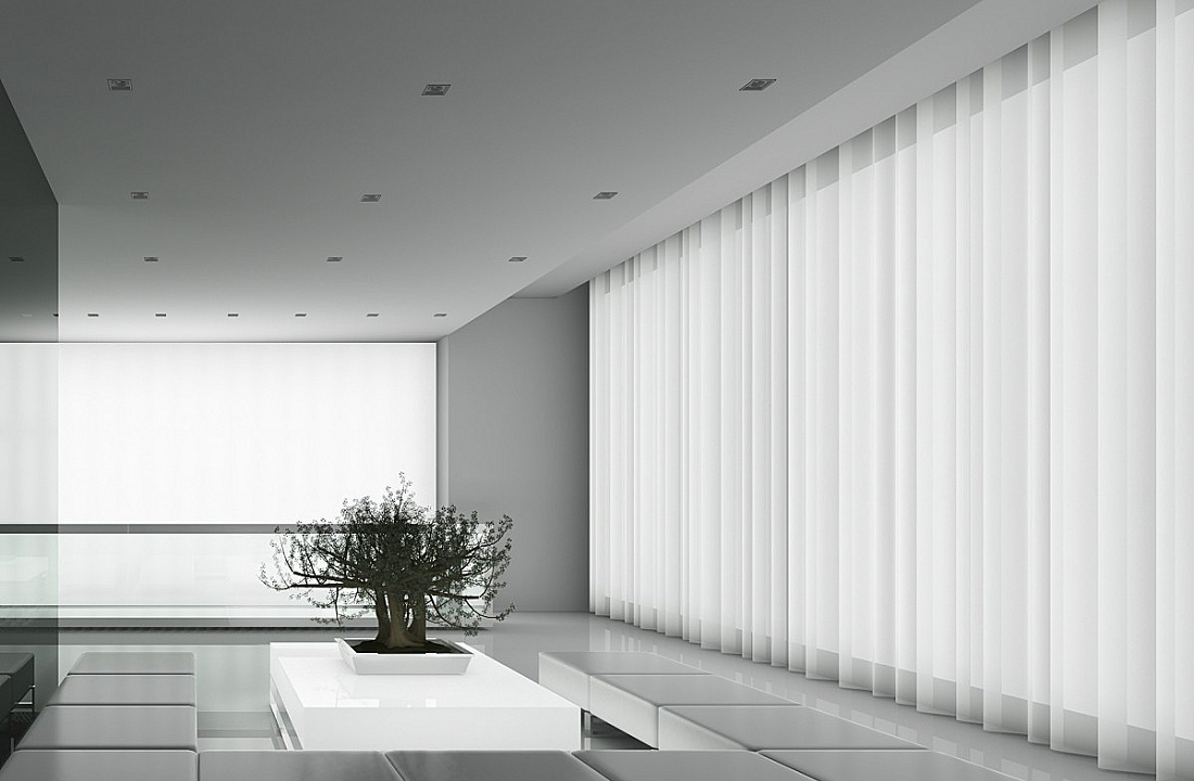 Bright room featuring ERCO recessed ceiling luminaires providing soft lighting. Curtains and furniture act as illuminated elements.